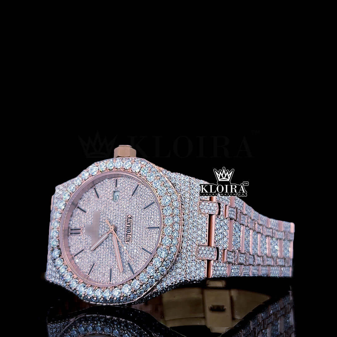 Rose gold fully iced out AP Moissanite diamond watch with a shimmering diamond-studded case and bright white dial.